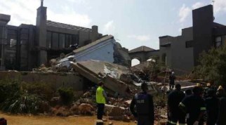 FILE PICTURE: Paramedics on the scene in Meyersdal Eco Estate, Alberton in the south of Johannesburg on 18 August 2014 after a building collapsed. Picture Alberton Record/CNS